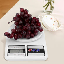 Precision digital scale with 10 kg capacity.